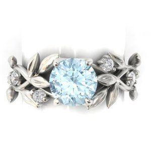 - ladies 925 sterling silver with light blue sapphire and diamond ring siz…